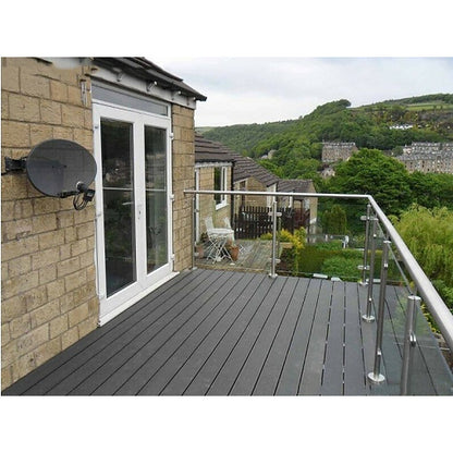 Glass balustrade with 316 stainless steel handrail installed