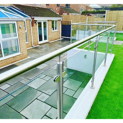 Glass balustrade with 316 stainless steel handrail installed