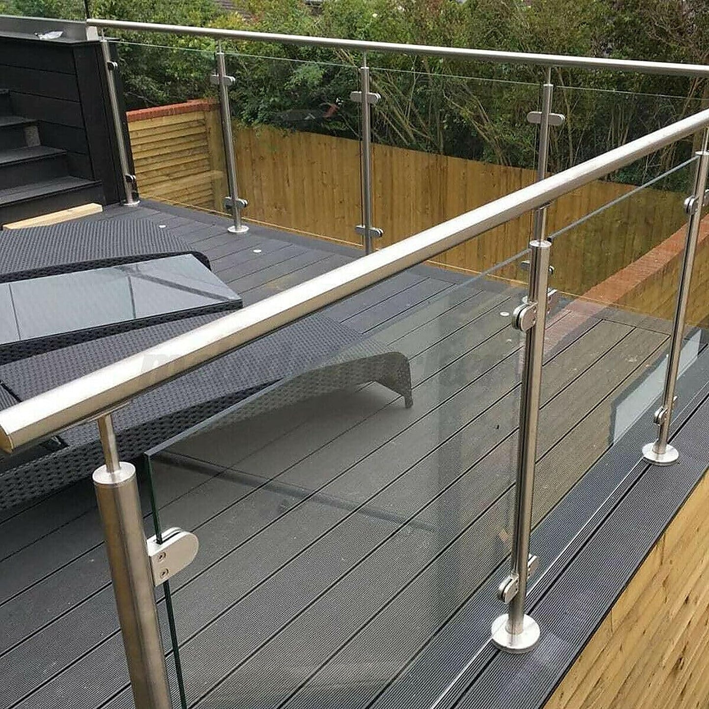 Glass balustrade with 316 stainless steel handrail installed