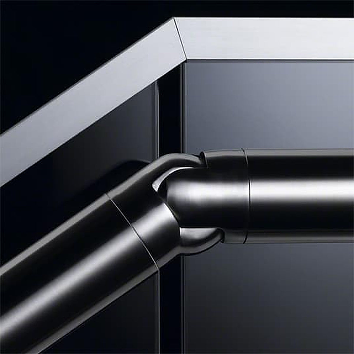 Adjustable handrail elbow installed on a balustrade run
